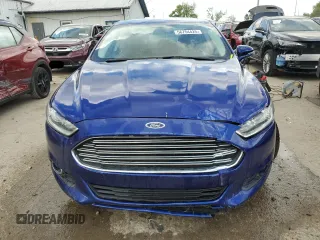 2015 Ford Fusion SE z VIN 3FA6P0HDXFR112560, wystawiony jako Copart lot #56754425 z przebiegiem 65 325 mil mil oraz Szkoda całkowita • Salvage title. Historia ofert i sprzedaży dostępna na DreamBid. Obrazek 5.