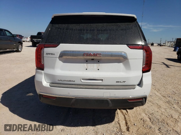 2024 GMC Yukon SLT with VIN 1GKS2BKD6RR237359, listed as a Copart auction lot 77892564 with 9,880 mi miles and Salvage Title. Bid and sale history available at carsss.com. Image 6.