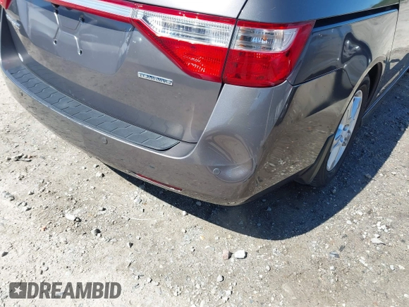 2012 Honda Odyssey Touring with VIN 5FNRL5H91CB057344, listed as a IAAI auction lot 41835272 with 158,854 mi miles. Bid and sale history available at carsss.com. Image 17.
