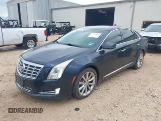 2013 Cadillac XTS Luxury with VIN 2G61P5S39D9182526, listed as a IAAI auction lot 42183995 with 132,778 mi miles. Bid and sale history available at carsss.com. Image 2.