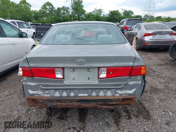 2001 Toyota Camry CE z VIN JT2BG22K410587070, wystawiony jako IAAI lot #42388043 z przebiegiem 119 183 mil mil oraz . Historia ofert i sprzedaży dostępna na DreamBid. Obrazek 17.