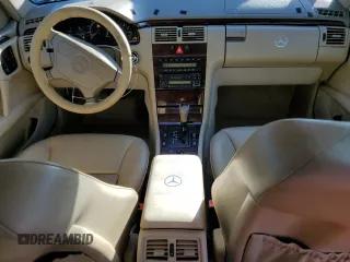 1998 Mercedes-Benz E-Class with VIN WDBJF65FXWA497997, listed as a Copart auction lot 87969125 with 145,322 mi miles and Salvage Title. Bid and sale history available at carsss.com. Image 8.