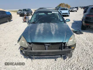 2002 Nissan Altima SE with VIN 1N4BL11D02C105510, listed as a Copart auction lot 74914454 with 117,242 mi miles and Salvage Title. Bid and sale history available at carsss.com. Image 5.