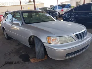 1998 Acura RL with VIN JH4KA9666WC006008, listed as a IAAI auction lot 41675045 with 232,087 mi miles and . Bid and sale history available at DreamBid. Image 1.