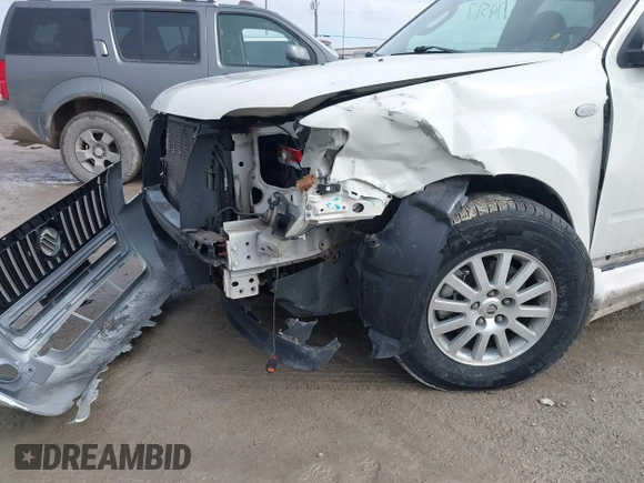 2009 Mercury Mariner Premier with VIN 4M2CU97G19KJ01231, listed as a IAAI auction lot 41674517 with Not Provided miles and . Bid and sale history available at DreamBid. Image 6.