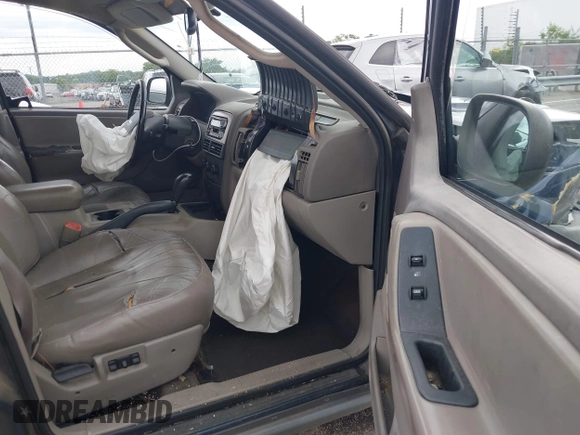 2002 Jeep Grand Cherokee Laredo with VIN 1J4GX48S02C125258, listed as a IAAI auction lot 42388724 with 295,270 mi miles and . Bid and sale history available at DreamBid. Image 5.