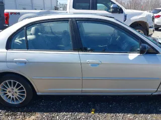 2005 Honda Civic Sdn LX with VIN 2HGES165X5H616026, listed as a IAAI auction lot 41733041 with 201,911 mi miles. Bid and sale history available at carsss.com. Image 13.