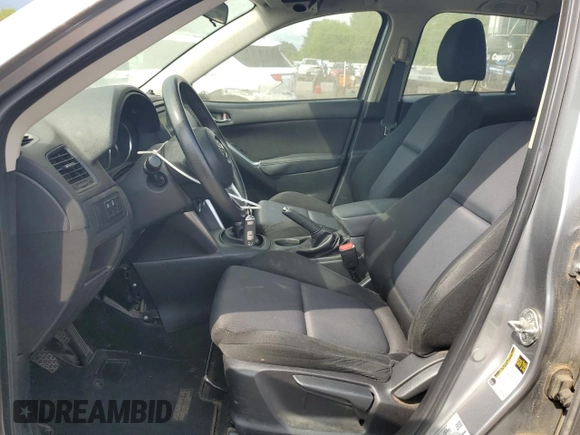 2014 Mazda CX-5 Sport with VIN JM3KE2BE7E0350965, listed as a Copart auction lot 60130195 with 196,072 mi miles and Clean title. Bid and sale history available at DreamBid. Image 7.