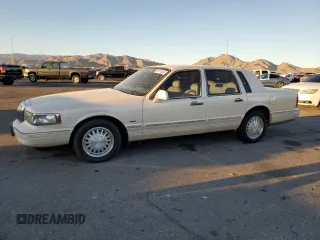 1996 Lincoln Town Car Cartier z VIN 1LNLM83W0TY610739, wystawiony jako Copart lot #41874435 z przebiegiem 93 306 mil mil oraz Czysty tytuł • Clean title. Historia ofert i sprzedaży dostępna na DreamBid. Obrazek 1.