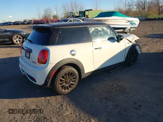 2020 MINI Hardtop Cooper S z VIN WMWXR5C00L2L49498, wystawiony jako IAAI lot #40679562 z przebiegiem 48 387 mil mil oraz . Historia ofert i sprzedaży dostępna na DreamBid. Obrazek 4.