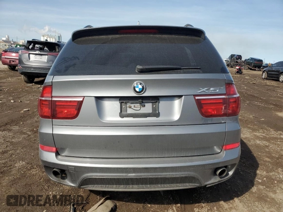 2012 BMW X5 35i with VIN 5UXZV4C51CL764495, listed as a Copart auction lot 48718915 with Not provided miles and Salvage title. Bid and sale history available at DreamBid. Image 6.