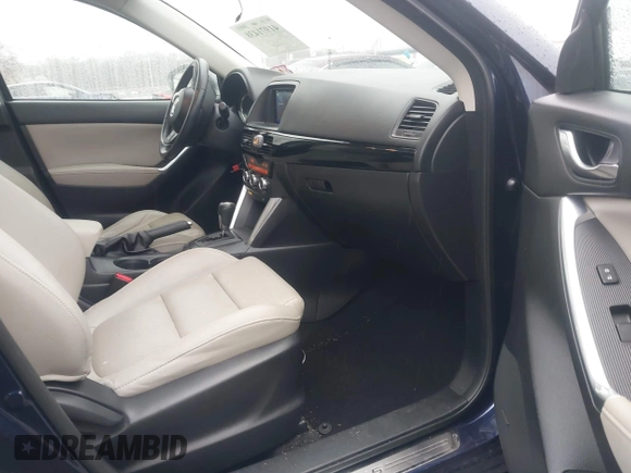2014 Mazda CX-5 Grand Touring with VIN JM3KE4DY8E0366644, listed as a IAAI auction lot 41971438 with 135,644 mi miles and . Bid and sale history available at carsss.com. Image 5.