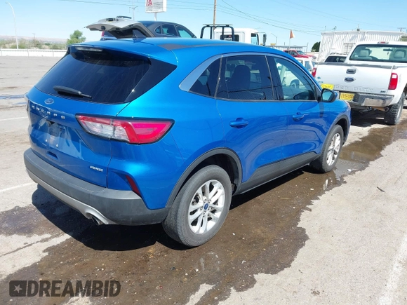 2021 Ford Escape SE with VIN 1FMCU9G6XMUA81082, listed as a IAAI auction lot 42056323 with 83,904 mi miles. Bid and sale history available at carsss.com. Image 4.