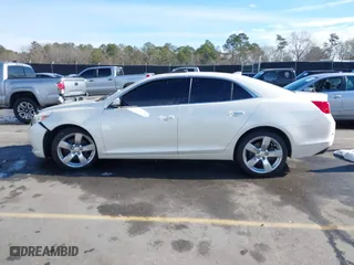 2014 Chevrolet Malibu LTZ with VIN 1G11J5SXXEF114531, listed as a IAAI auction lot 41409618 with 153,040 mi miles. Bid and sale history available at carsss.com. Image 15.
