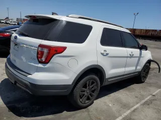 2019 Ford Explorer XLT z VIN 1FM5K8D89KGA28349, wystawiony jako Copart lot #61260465 z przebiegiem 26 254 mil mil oraz Szkoda całkowita • Salvage title. Historia ofert i sprzedaży dostępna na DreamBid. Obrazek 3.