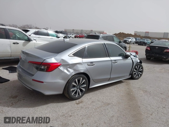 2023 Honda Civic EX with VIN 2HGFE1F77PH321210, listed as a IAAI auction lot 41797011 with 8,748 mi miles and . Bid and sale history available at DreamBid. Image 4.