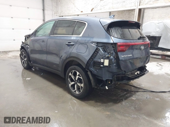 2021 Kia Sportage LX with VIN KNDPMCAC2M7877132, listed as a IAAI auction lot 41443934 with 9,528 mi miles and . Bid and sale history available at carsss.com. Image 3.
