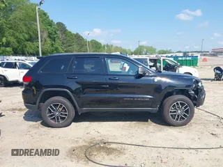 2017 Jeep Grand Cherokee Trailhawk with VIN 1C4RJFLG4HC940652, listed as a IAAI auction lot 42135489 with 102,593 mi miles and . Bid and sale history available at DreamBid. Image 14.