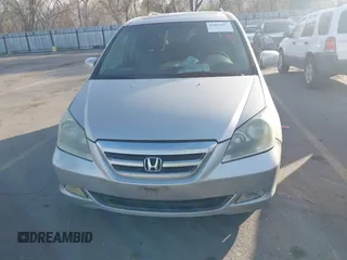 2005 Honda Odyssey TOURING with VIN 5FNRL38875B004209, listed as a IAAI auction lot 42003057 with 242,794 mi miles. Bid and sale history available at carsss.com. Image 6.