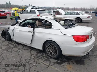 2011 BMW 3 Series 335i with VIN WBADX7C50BE580088, listed as a IAAI auction lot 41309990 with Not Provided miles and . Bid and sale history available at carsss.com. Image 3.