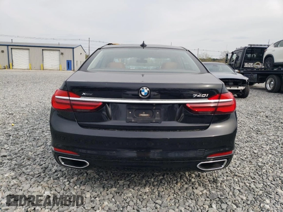 2018 BMW 7 Series 740i xDrive с VIN WBA7E4C58JGV23724, выставлен на аукционе Copart как лот 54731955 с пробегом 146 936 миль миль и Чистый • Clean title. История ставок и продаж доступна на DreamBid. Изображение 6.
