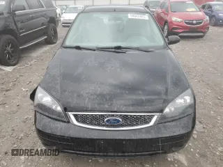2005 Ford Focus S with VIN 1FAFP34N45W285454, listed as a Copart auction lot 59043485 with 165,071 mi miles and Salvage title. Bid and sale history available at DreamBid. Image 5.