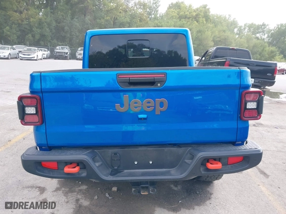 2023 Jeep Gladiator Mojave with VIN 1C6JJTEG0PL593061, listed as a IAAI auction lot 40287955 with 3,930 mi miles. Bid and sale history available at carsss.com. Image 17.