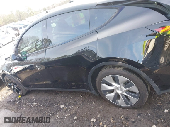 2023 Tesla Model Y Long Range z VIN 7SAYGAEE5PF603128, wystawiony jako IAAI lot #41328797 z przebiegiem 63 527 mil mil oraz . Historia ofert i sprzedaży dostępna na DreamBid. Obrazek 14.