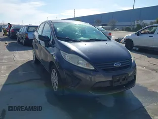 2012 Ford Fiesta S with VIN 3FADP4AJXCM187721, listed as a IAAI auction lot 41269984 with 118,474 mi miles. Bid and sale history available at carsss.com. Image 1.
