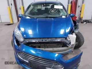 2019 Ford Fiesta SE z VIN 3FADP4BJXKM118427, wystawiony jako IAAI lot #41643927 z przebiegiem 109 617 mil mil oraz . Historia ofert i sprzedaży dostępna na DreamBid. Obrazek 11.
