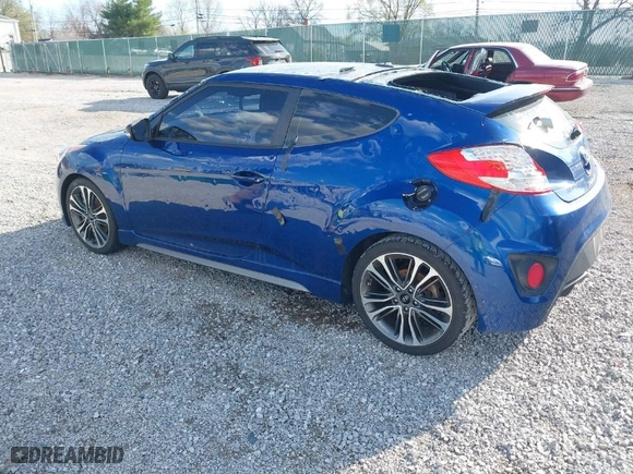 2016 Hyundai Veloster Turbo with VIN KMHTC6AE4GU260112, listed as a IAAI auction lot 41868273 with 130,853 mi miles. Bid and sale history available at carsss.com. Image 3.