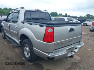 2004 Ford Explorer Sport Trac XLS z VIN 1FMDU77K74UA77223, wystawiony jako IAAI lot #42167996 z przebiegiem Nie podano mil oraz . Historia ofert i sprzedaży dostępna na DreamBid. Obrazek 3.