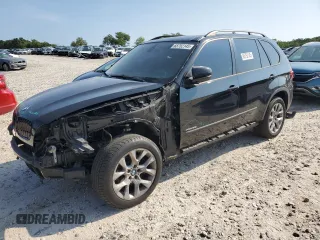 2012 BMW X5 35i with VIN 5UXZV4C57CL756062, listed as a Copart auction lot 65752145 with 160,860 mi miles and Clean title. Bid and sale history available at DreamBid. Image 1.