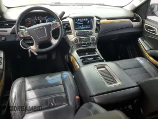2017 GMC Yukon Denali with VIN 1GKS1CKJ9HR211240, listed as a Copart auction lot 50973015 with 95,484 mi miles and Salvage Title. Bid and sale history available at carsss.com. Image 8.
