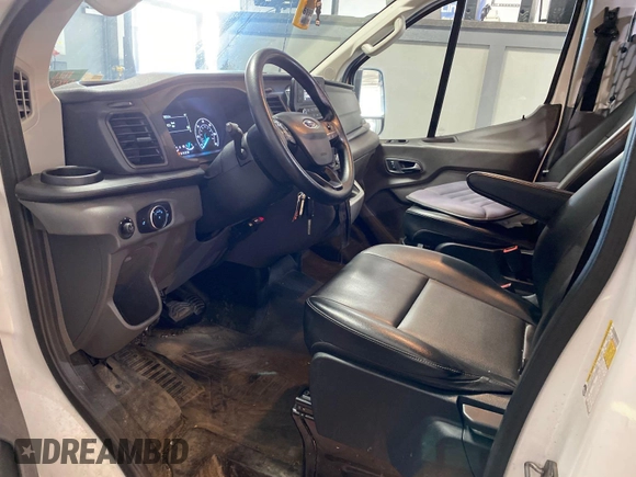 2020 Ford Transit Cargo with VIN 1FTBR1Y87LKA53852, listed as a IAAI auction lot 42300106 with 89,023 mi miles and . Bid and sale history available at DreamBid. Image 7.