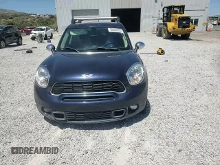 2013 MINI Countryman S ALL4 with VIN WMWZC5C50DWM15256, listed as a Copart auction lot 58080895 with 123,514 mi miles and Salvage title. Bid and sale history available at DreamBid. Image 13.