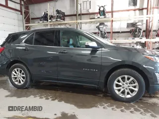 2019 Chevrolet Equinox LT with VIN 2GNAXUEV7K6113098, listed as a IAAI auction lot 41218077 with 98,553 mi miles and . Bid and sale history available at carsss.com. Image 13.