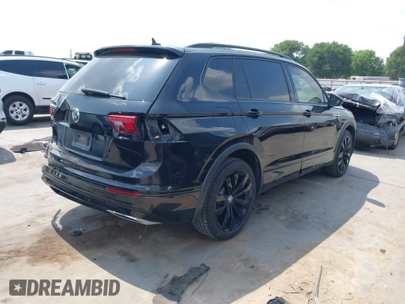 2021 Volkswagen Tiguan SE z VIN 3VV3B7AX0MM047478, wystawiony jako IAAI lot #42144239 z przebiegiem 55 468 mil mil oraz . Historia ofert i sprzedaży dostępna na DreamBid. Obrazek 4.
