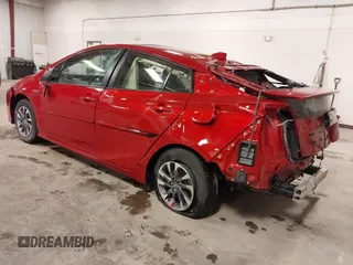2021 Toyota Prius L Eco z VIN JTDKAMFU1M3143311, wystawiony jako IAAI lot #41961005 z przebiegiem 42 275 mil mil oraz . Historia ofert i sprzedaży dostępna na DreamBid. Obrazek 3.