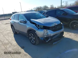 2018 Honda CR-V EX with VIN 7FARW2H56JE097214, listed as a IAAI auction lot 42061999 with 74,862 mi miles and . Bid and sale history available at carsss.com. Image 1.