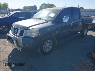 2004 Nissan Titan LE with VIN 1N6AA07B74N547779, listed as a IAAI auction lot 41977881 with 157,348 mi miles and . Bid and sale history available at carsss.com. Image 2.