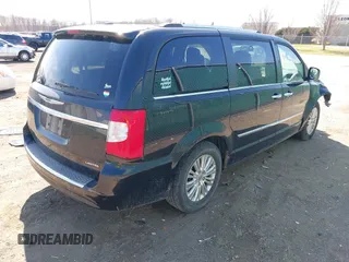 2015 Chrysler Town & Country Limited Platinum with VIN 2C4RC1GG2FR529357, listed as a IAAI auction lot 41924159 with 220,575 mi miles and . Bid and sale history available at DreamBid. Image 4.