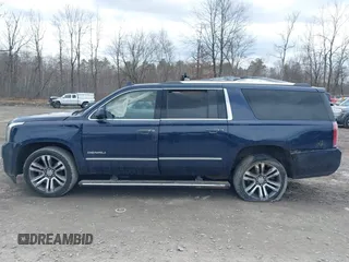 2020 GMC Yukon XL Denali with VIN 1GKS2HKJ3LR177072, listed as a IAAI auction lot 41879461 with 102,971 mi miles. Bid and sale history available at carsss.com. Image 13.