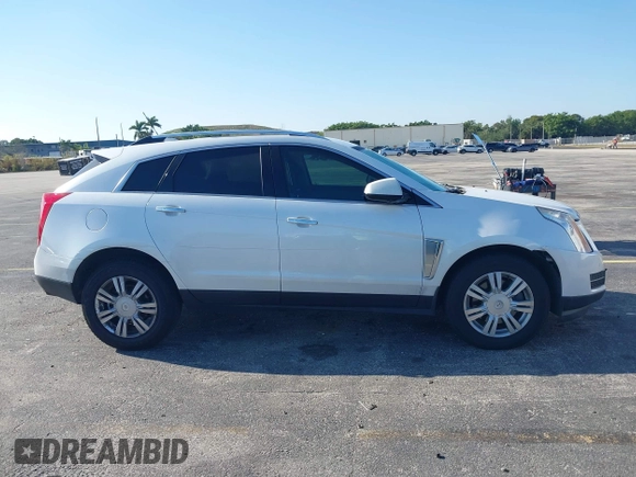 2016 Cadillac SRX Luxury Collection with VIN 3GYFNBE39GS548327, listed as a IAAI auction lot 41889611 with 140,670 mi miles. Bid and sale history available at carsss.com. Image 13.