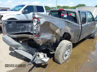 2003 Nissan Frontier XE with VIN 1N6ED29X73C424295, listed as a IAAI auction lot 42622922 with 200,599 mi miles and . Bid and sale history available at DreamBid. Image 6.