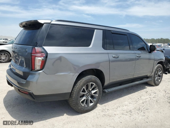2022 Chevrolet Suburban Z71 with VIN 1GNSKDKD3NR148101, listed as a Copart auction lot 52329935 with 123,112 mi miles and Salvage Title. Bid and sale history available at carsss.com. Image 3.