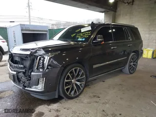 2017 Cadillac Escalade Premium Luxury with VIN 1GYS3CKJ0HR263565, listed as a IAAI auction lot 41615401 with 105,773 mi miles. Bid and sale history available at carsss.com. Image 2.