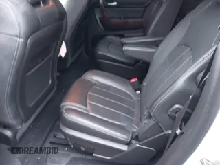 2014 Chevrolet Traverse LTZ z VIN 1GNKRJKDXEJ263349, wystawiony jako IAAI lot #41180521 z przebiegiem 141 564 mil mil oraz . Historia ofert i sprzedaży dostępna na DreamBid. Obrazek 8.
