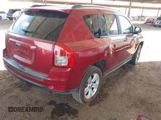 2011 Jeep Compass Latitude with VIN 1J4NT1FB0BD151647, listed as a IAAI auction lot 41950743 with 128,238 mi miles. Bid and sale history available at carsss.com. Image 4.