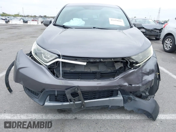 2019 Honda CR-V LX with VIN 2HKRW5H31KH400639, listed as a IAAI auction lot 42159026 with 45,245 mi miles and . Bid and sale history available at carsss.com. Image 6.